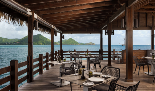 sandals over water dinner