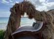 Heart-shaped thatched lounger on the beach at Sandals Royal Curaçao