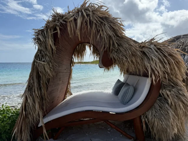 Heart-shaped thatched lounger on the beach at Sandals Royal Curaçao