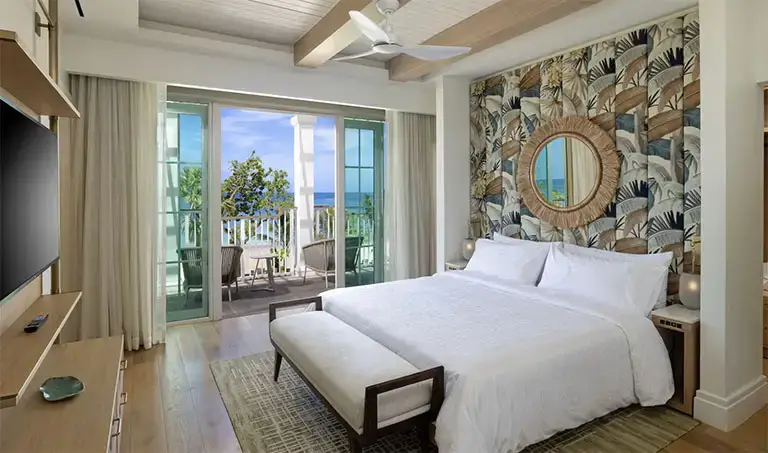 Oceanview bedroom suite with tropical decor at Beaches Negril