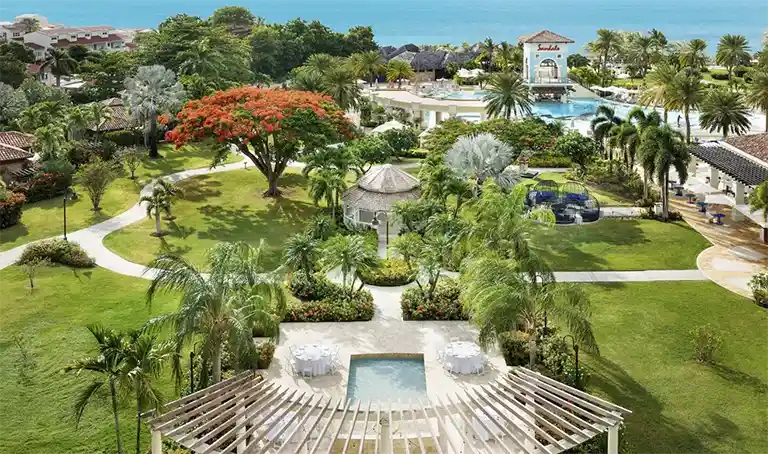 Aerial view of manicured gardens and gazebo at Sandals Grande Antigua