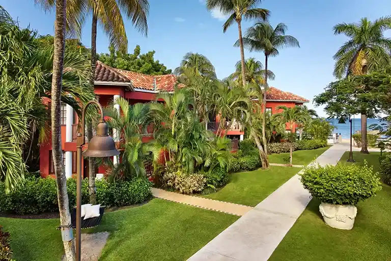 Honeymoon suite exterior with private plunge pool at Sandals Grande Antigua