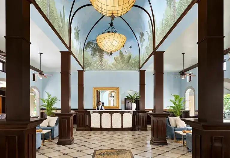 Elegant lobby with domed painted ceiling at Sandals Grande Antigua