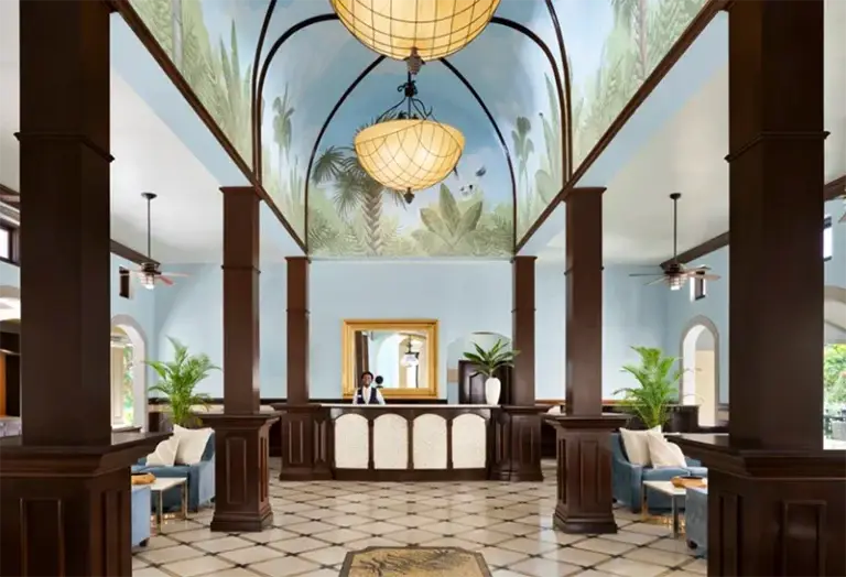 Grand lobby with painted domed ceiling at Sandals Grande Antigua