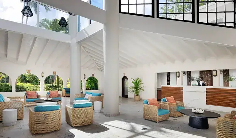 Bright lobby lounge interior at Sandals Grande Antigua