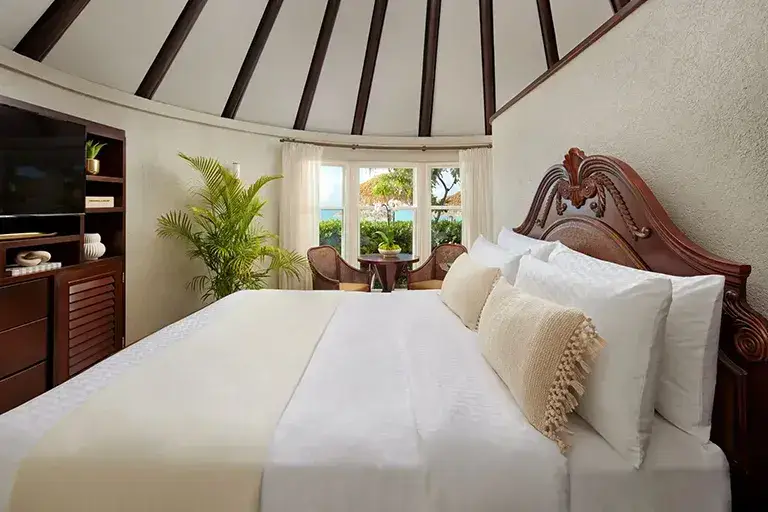 Rondoval suite bedroom at Sandals Grande Antigua
