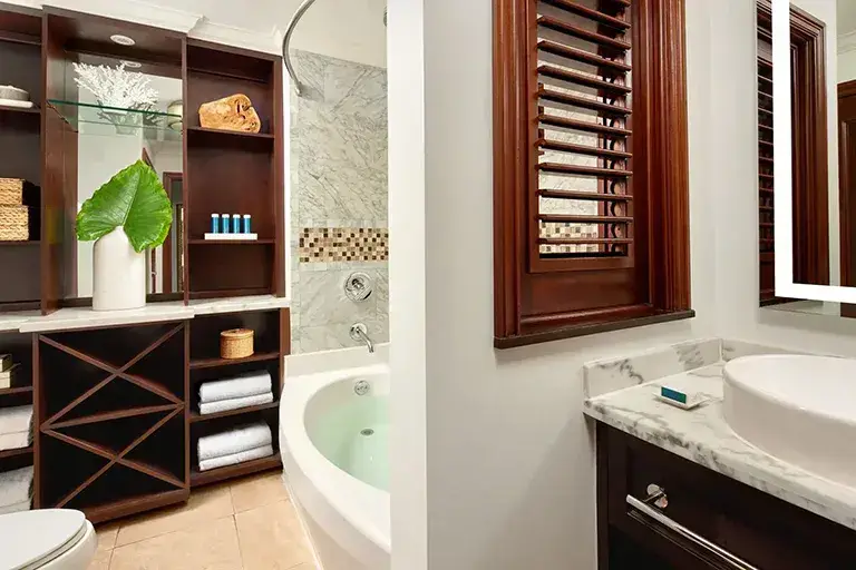 Suite bathroom with soaking tub at Sandals Grande Antigua