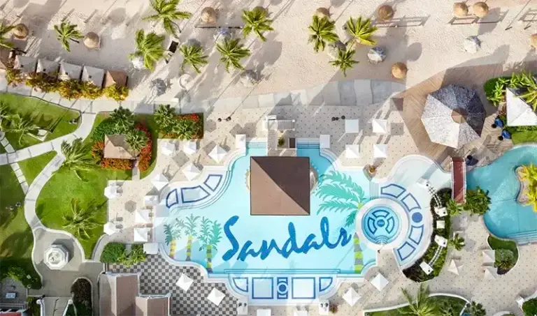 Aerial view of the pool with Sandals logo design at Sandals Grande St. Lucian