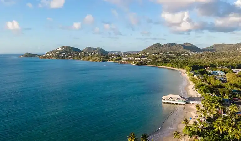 Aerial coastline view of Sandals Halcyon Beach resort
