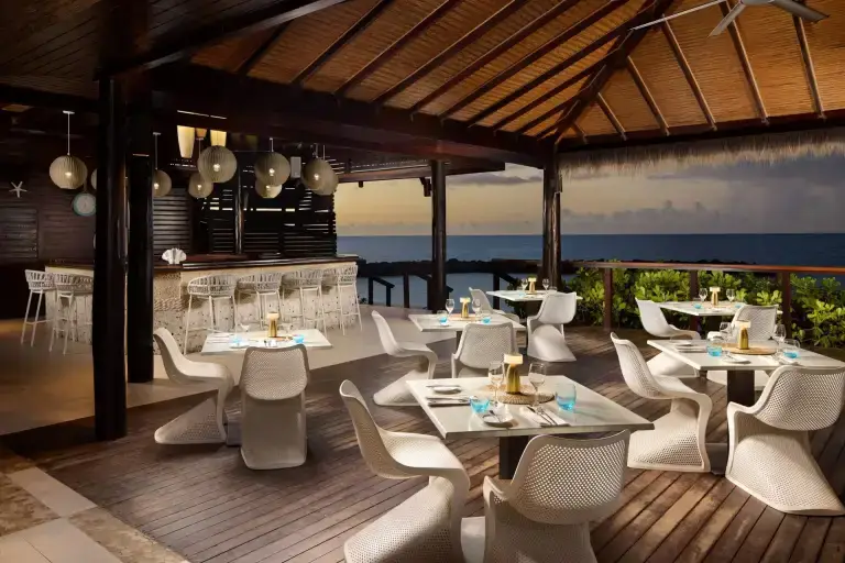 Neptune's restaurant in the evening at Sandals La Source Grenada