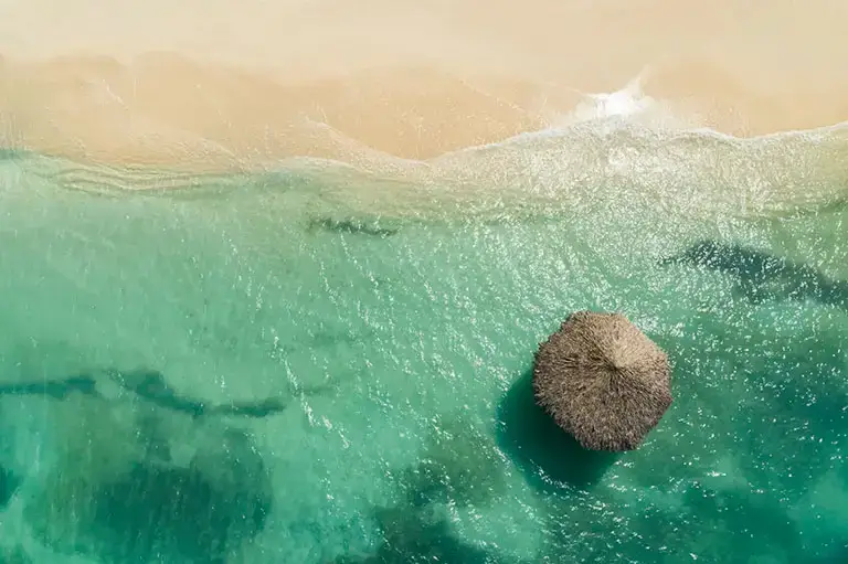Aerial drone view of beach cabanas at Sandals Montego Bay