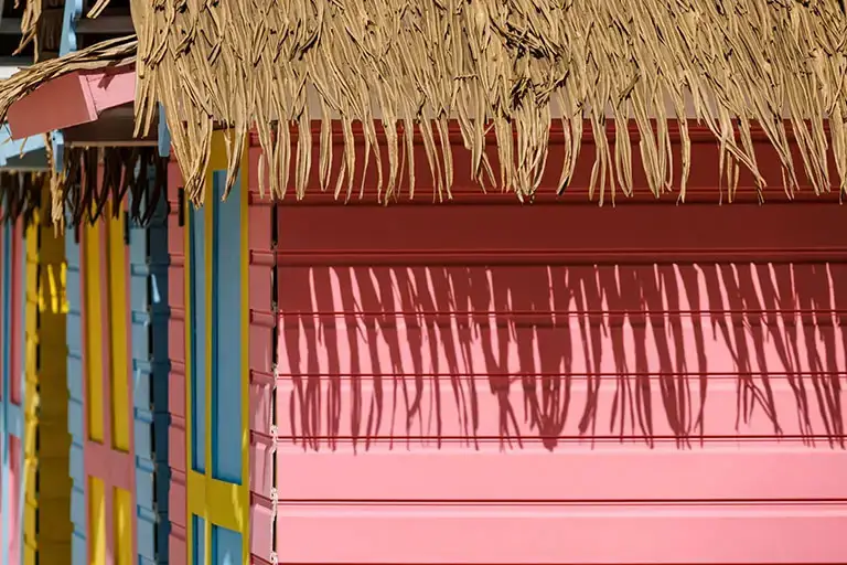 Colorful beach shacks on the grounds at Sandals Montego Bay