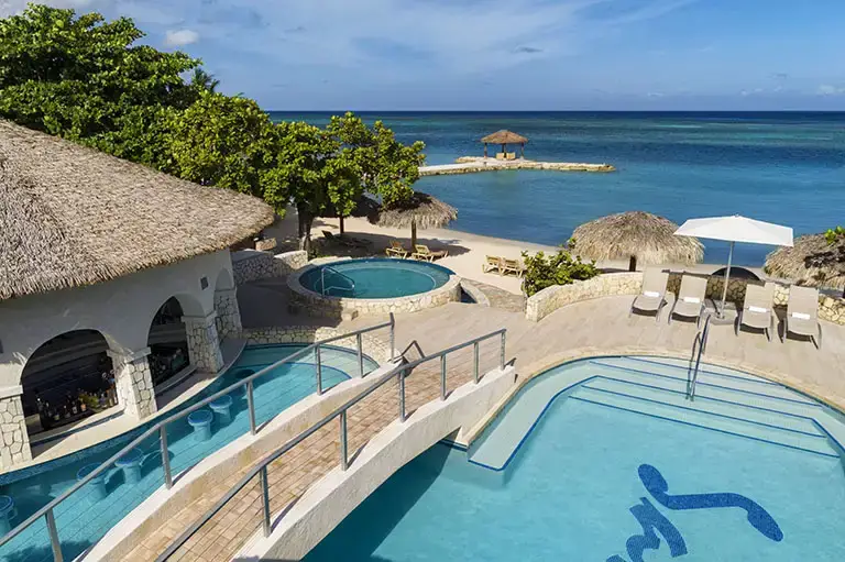 Piano bar and beach view at Sandals Montego Bay