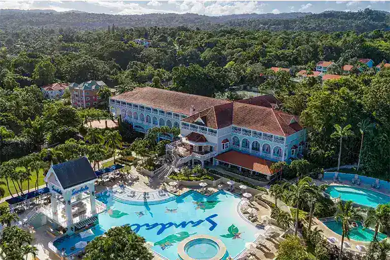 Aerial view of Sandals Ochi Beach Resort's Great House and pools, Jamaica