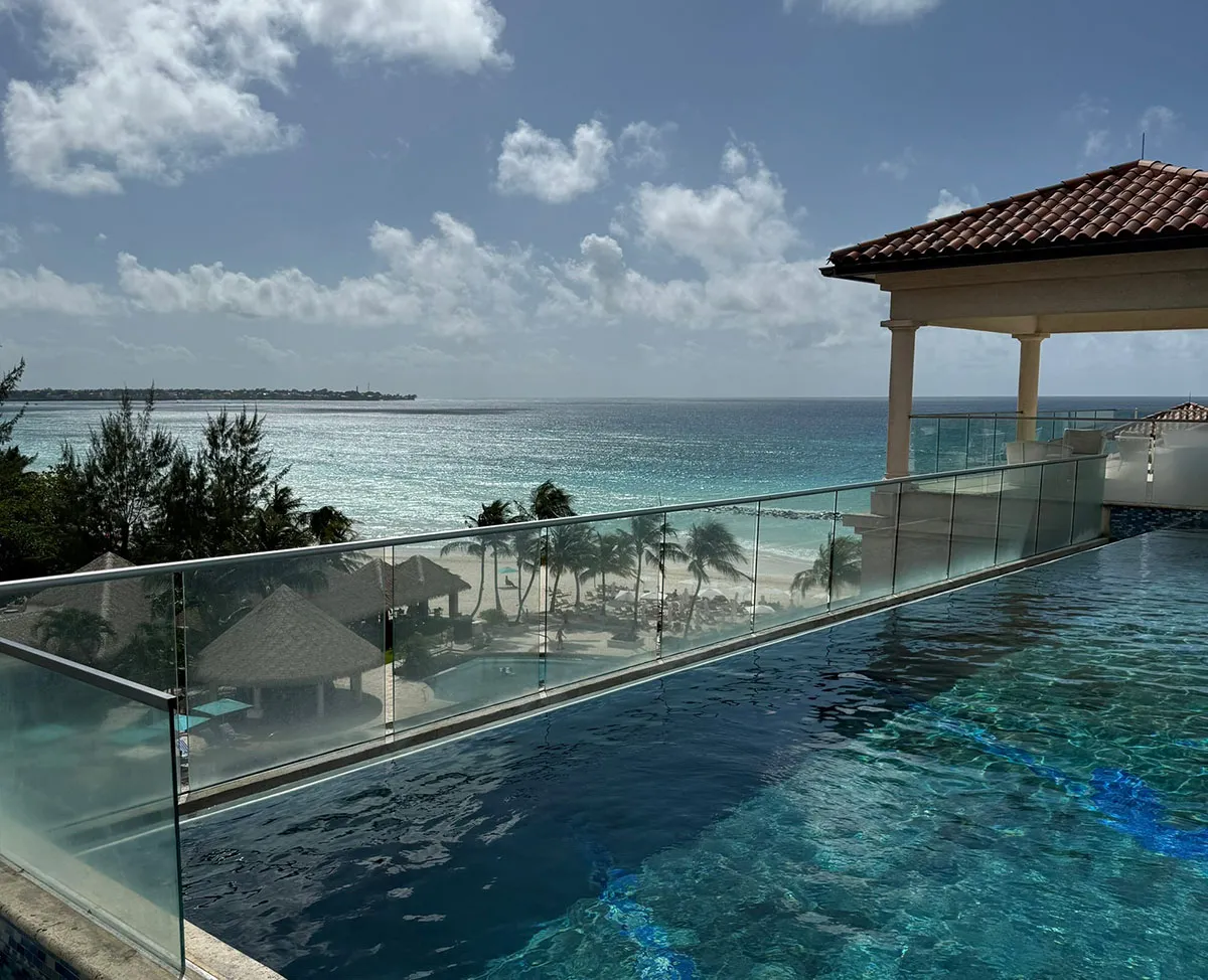 Rooftop infinity pool overlooking the ocean at a Sandals resort