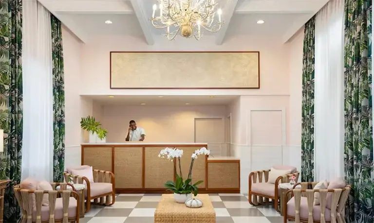 Elegant lobby and front desk at Sandals Royal Bahamian, Nassau