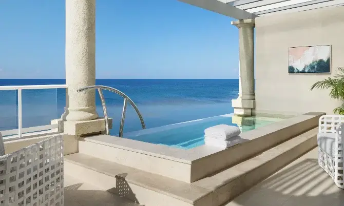 Oceanfront terrace with private plunge pool and ocean views at Sandals Royal Caribbean
