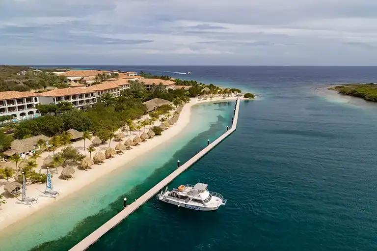 Aerial view of the beach and coastline at Sandals Royal Curacao