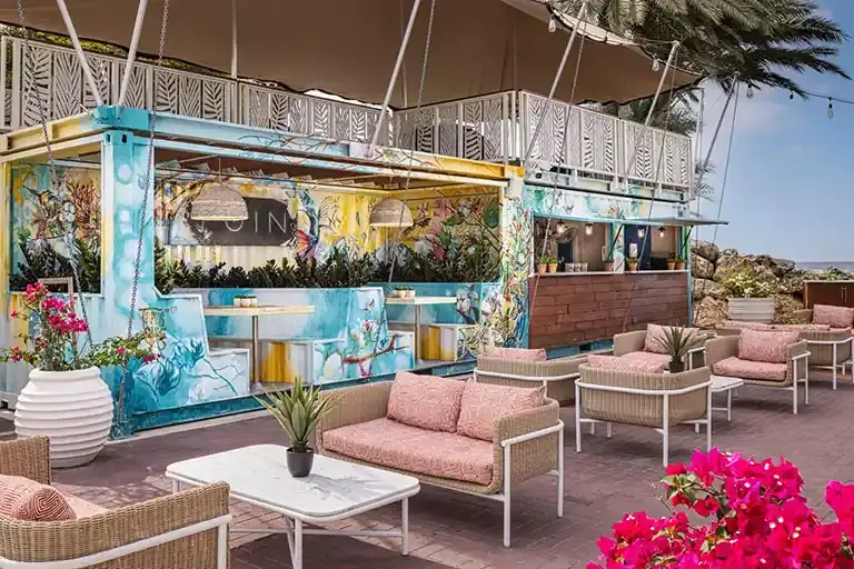 Seating area at the Food Trucks restaurant at Sandals Royal Curacao