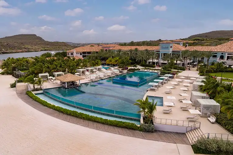 Main pool overlooking the ocean at Sandals Royal Curacao