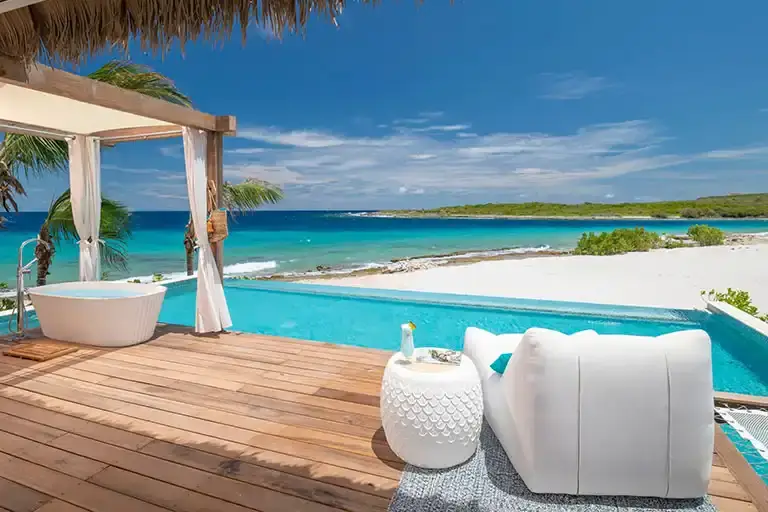 Oceanfront suite patio at Sandals Royal Curacao
