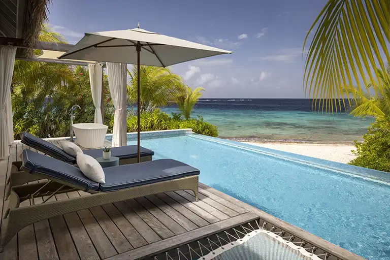 Private suite patio with plunge pool and ocean view at Sandals Royal Curacao