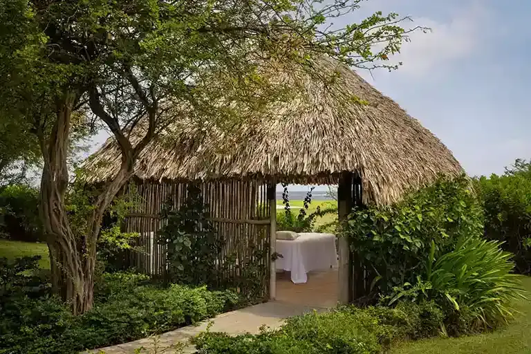 Massage tiki hut at the Red Lane Spa at Sandals Royal Curacao