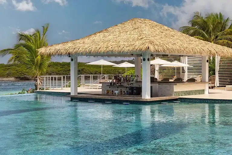 Swim-up pool bar at Sandals Royal Curacao