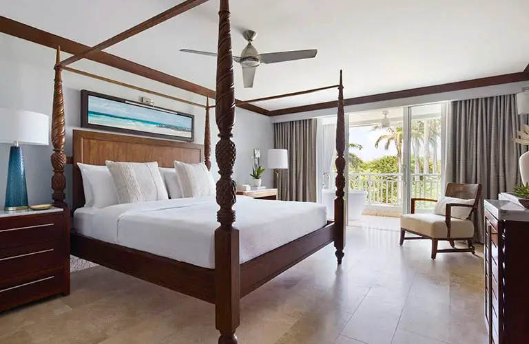 Luxury room bedroom at Sandals Barbados