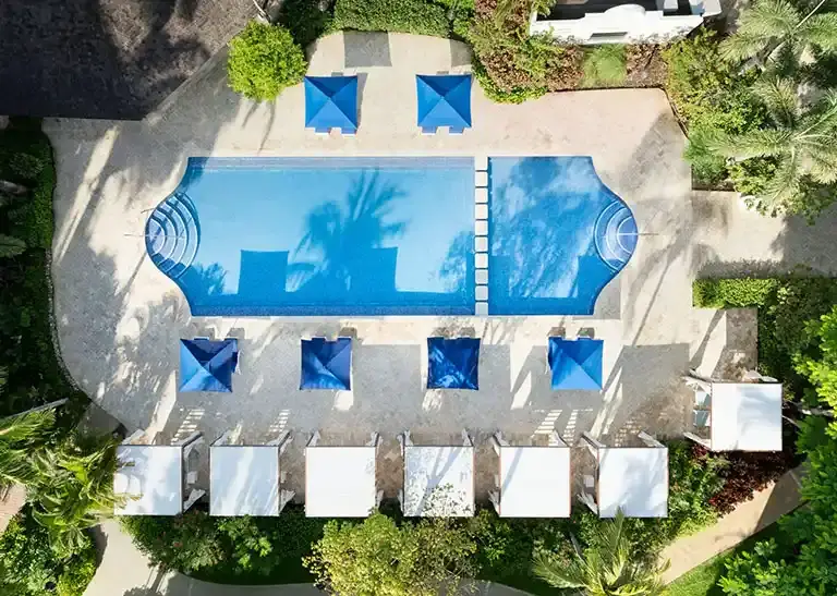 Aerial view of the main pool and sun loungers at Sandals Barbados