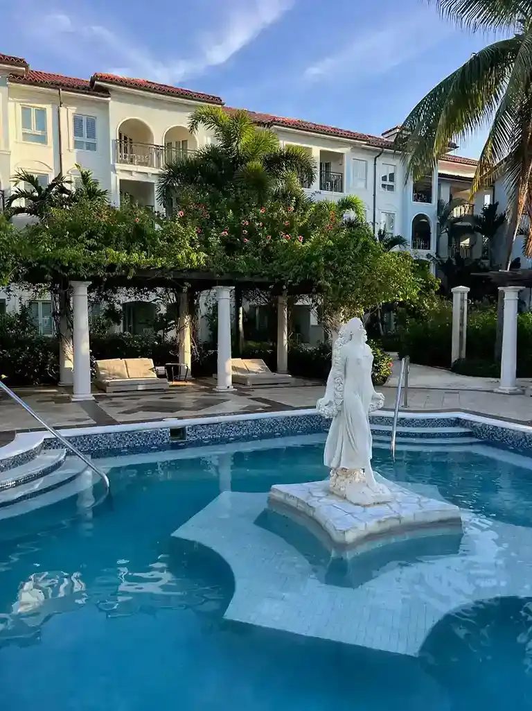Courtyard fountain statue pool at Sandals South Coast